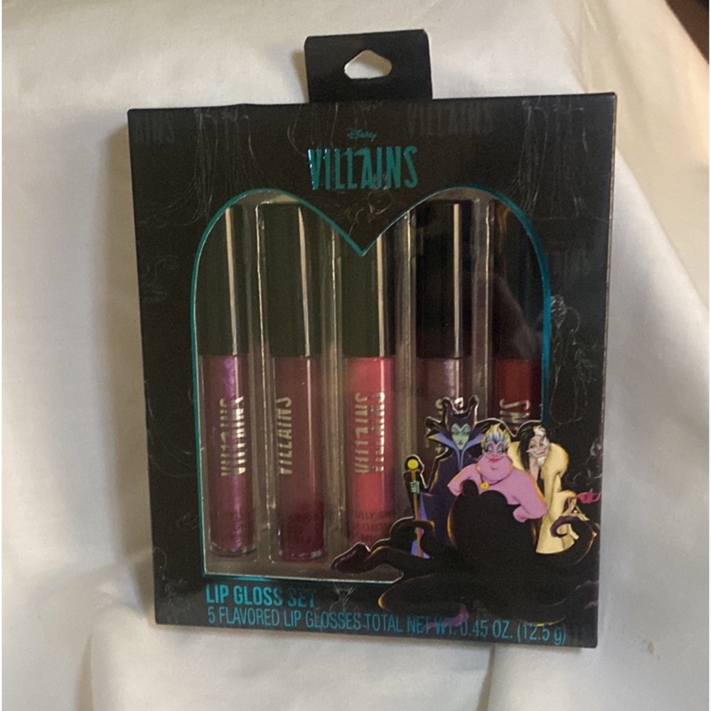 Disney Villains lip gloss. Set of five flavored lip glosses. Brand new in box